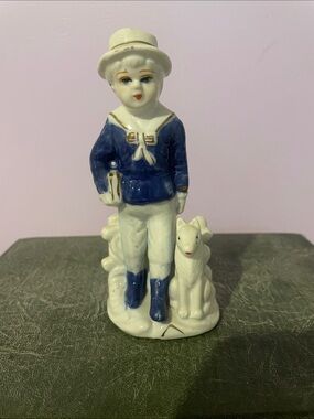 Porcelain Boy Figurine in Blue and White
